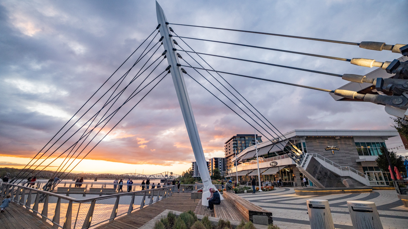 Vancouver Waterfront with cable-stayed bridge and Taphouse at sunset